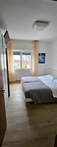 Postel nebo postele na pokoji v ubytování l'igloo b&b