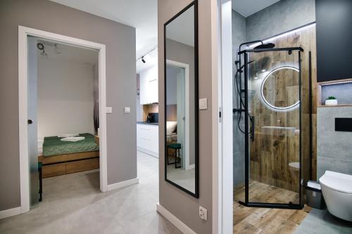 Ένα μπάνιο στο Apartament LOFT w Lagunie Beskidów