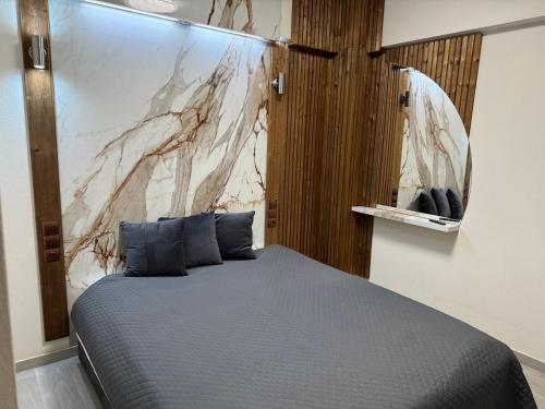 Ένα ή περισσότερα κρεβάτια σε δωμάτιο στο Sunny Point Apartments Nikiti