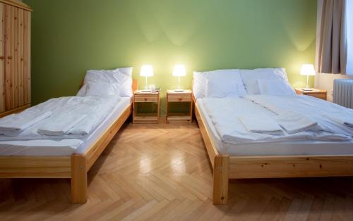 Postel nebo postele na pokoji v ubytování Csömöri Vendégház