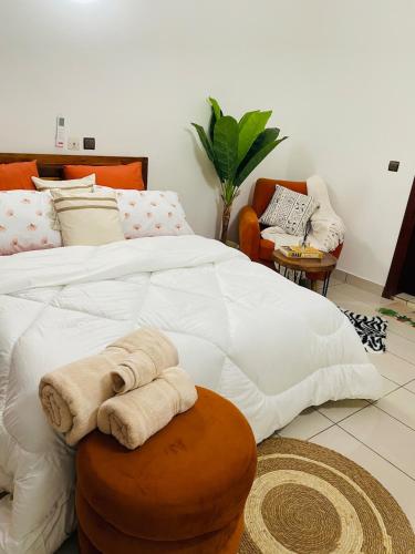 Ένα ή περισσότερα κρεβάτια σε δωμάτιο στο Appart F3 haut standing Riviera