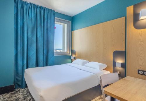 Katil atau katil-katil dalam bilik di B&B HOTEL Marseille Les Ports