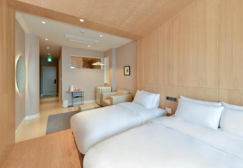 Postel nebo postele na pokoji v ubytování Frux Flux hotel