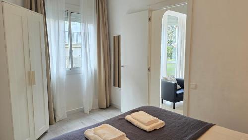 Postel nebo postele na pokoji v ubytování Opening Doors Gràcia