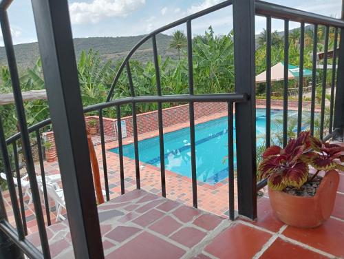 Bazén v ubytování Curitagua Hotel Campestre nebo v jeho okolí