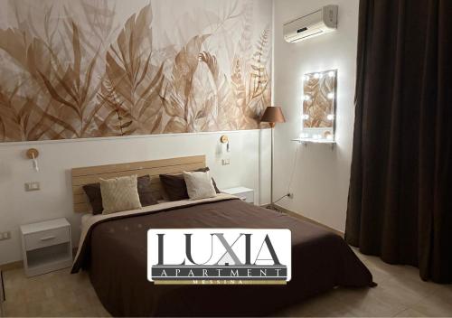 Foto LuXia Apartment - svincolo MESSINA CENTRO 1