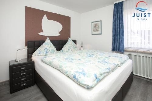 Postel nebo postele na pokoji v ubytování Haus Sylke 137 - Ferienwohnung 7