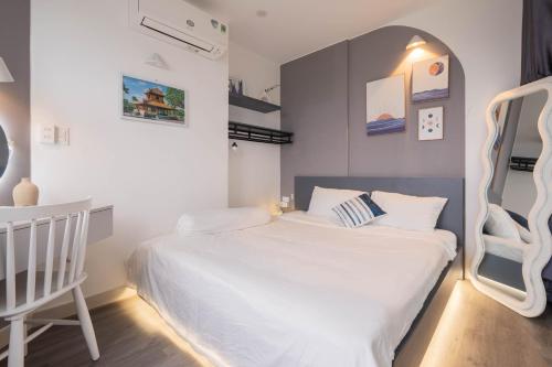 Katil atau katil-katil dalam bilik di Căn hộ Vip 2Phòng ngủ 2 View- Huế Ơi 3