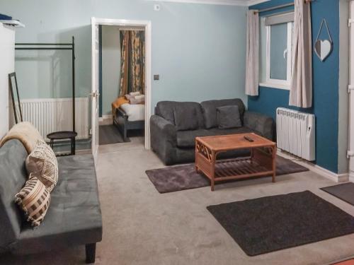 Khu vực ghế ngồi tại The Annex Cottage