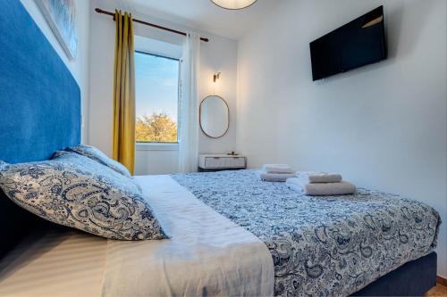 Ένα ή περισσότερα κρεβάτια σε δωμάτιο στο Royal View Suite - Corfu Town