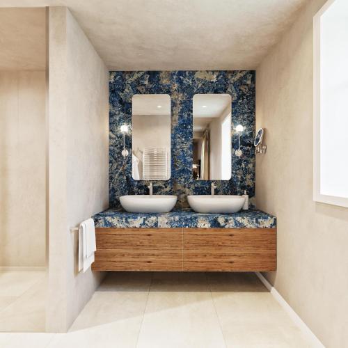 a bathroom with two sinks and a mirror at Santa Boka in Perast