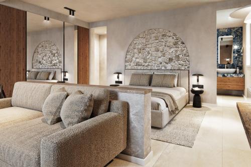 a bedroom with two beds and a couch at Santa Boka in Perast