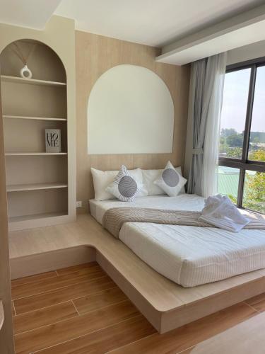 Ένα ή περισσότερα κρεβάτια σε δωμάτιο στο One-bedroom apartments with kitchen