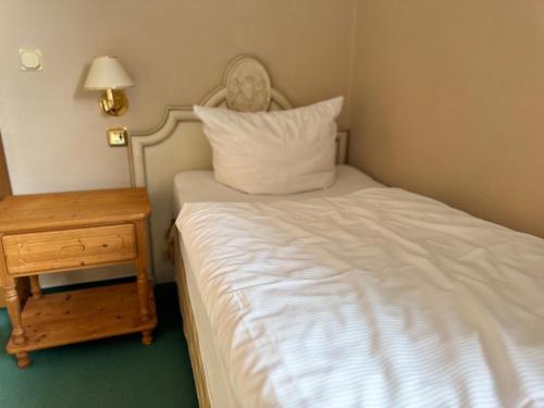 Postel nebo postele na pokoji v ubytování Hotel Bodeblick