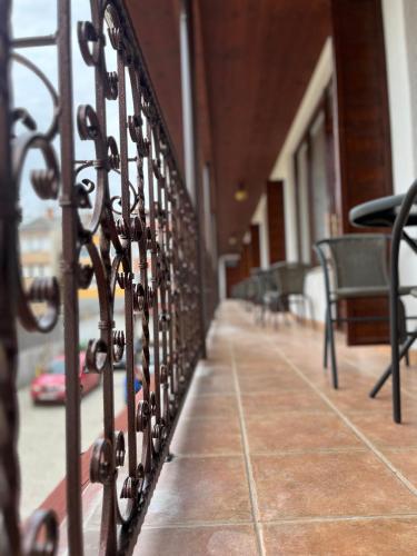 a row of metal railing in a building at Hegyalja Fogadó in Sárospatak