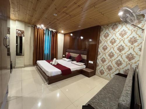 Ένα ή περισσότερα κρεβάτια σε δωμάτιο στο NR Stay