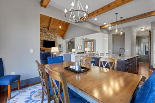 a dining room and kitchen with a table and chairs at Lakefront Getaway Dock Fire Pit & Games in Seneca