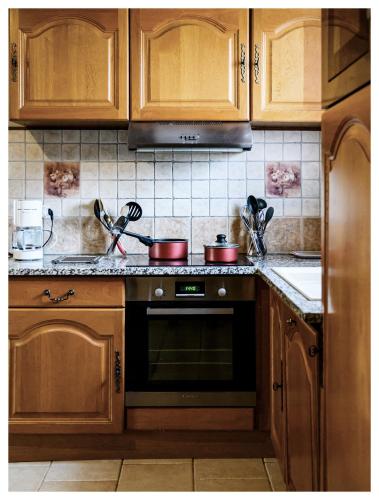 Dapur atau dapur kecil di Le Verger de Chenou