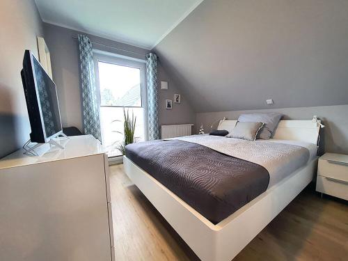 Fotografie z fotogalerie ubytování Ferienhaus Dünengras**** v destinaci Tating