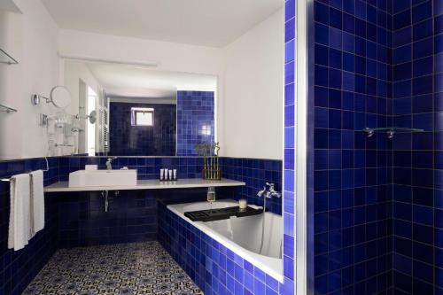 Ένα μπάνιο στο Relais Palazzo del Barone