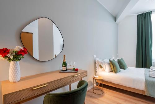 a bedroom with a bed and a mirror at Bazzi, 49 - Bocconi University in Milan