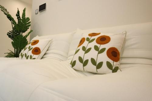 Postel nebo postele na pokoji v ubytování Hera Luxury Apartmant 5 sao - View Excellence