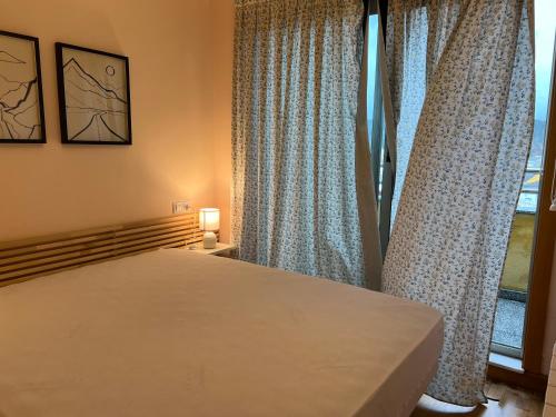 Ένα ή περισσότερα κρεβάτια σε δωμάτιο στο Apartamento Suite a pie de playa