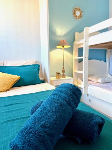 - une chambre avec des lits superposés dans l'établissement Le Nautile, à Les Sables-dʼOlonne