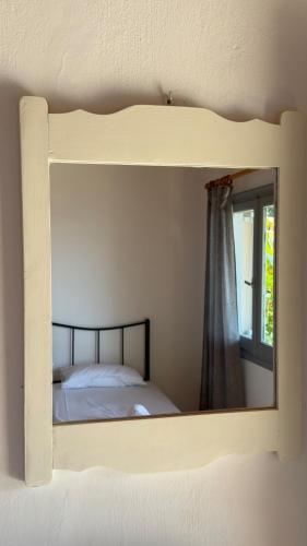 Ένα ή περισσότερα κρεβάτια σε δωμάτιο στο Olga's Sea View Studios, 400m from Ipsos Beach