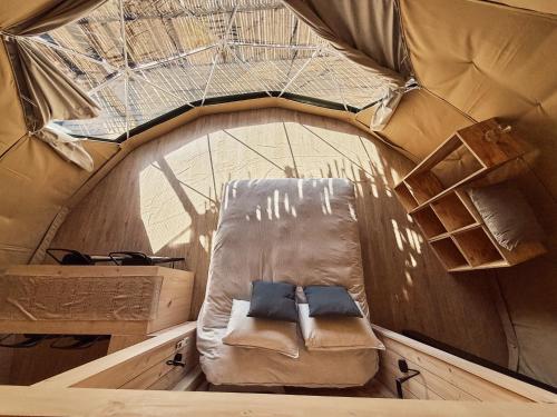an inside of a dome with a chair in it at Domos de Matanzas in Matanzas