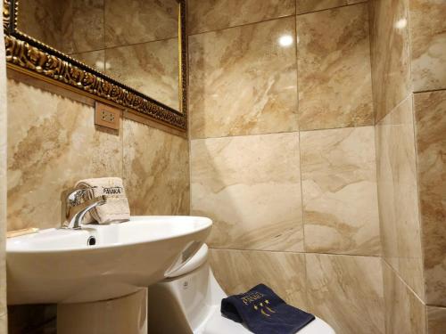 Koupelna v ubytování Hotel Panaka II