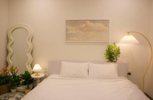 Postel nebo postele na pokoji v ubytování Hera Luxury Apartmant 5 sao - View Excellence