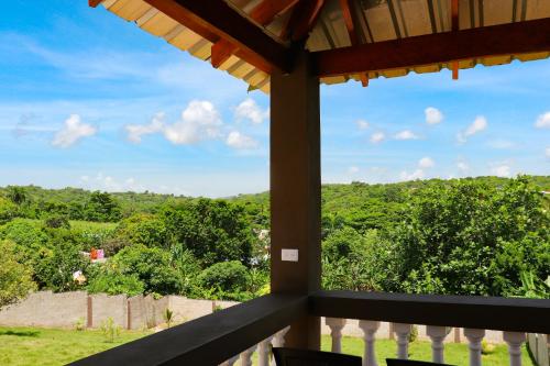 a view from the balcony of a house at Apart hotel Costa Verde#7 con cama Queen in Las Galeras