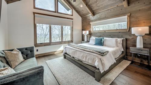 Ένα ή περισσότερα κρεβάτια σε δωμάτιο στο Aska Ridge Lodge
