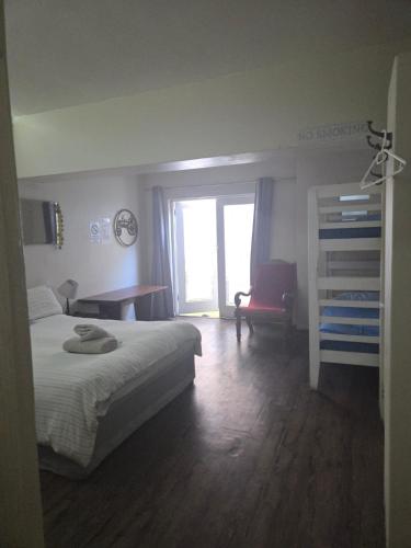 Ένα ή περισσότερα κρεβάτια σε δωμάτιο στο Yello Hotel