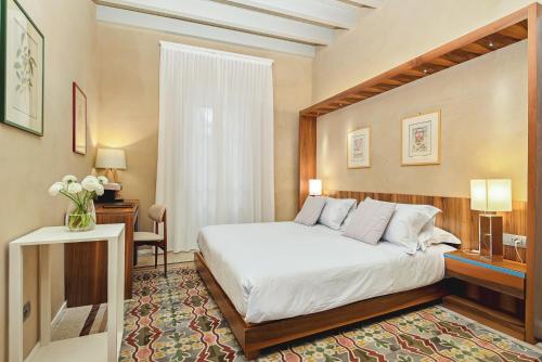Relais Montepepe Winery & Spaにあるベッド