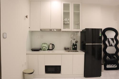 Kuchyň nebo kuchyňský kout v ubytování Hera Luxury Apartmant 5 sao - View Excellence