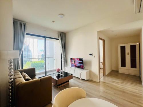 TV a/nebo společenská místnost v ubytování Hera Luxury Apartmant 5 sao - View Excellence