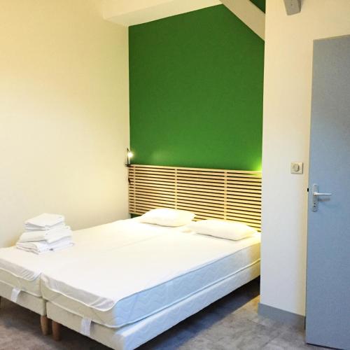 Postel nebo postele na pokoji v ubytování Appartements Rue Lemoine XXL
