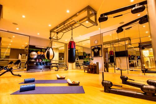 a gym with a bunch of mats in a room at Solaire Resort Entertainment City in Manila