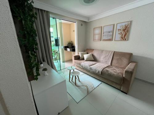 Zona de estar de Bombinhas Summer Beach Apto moderno a 300 m da praia