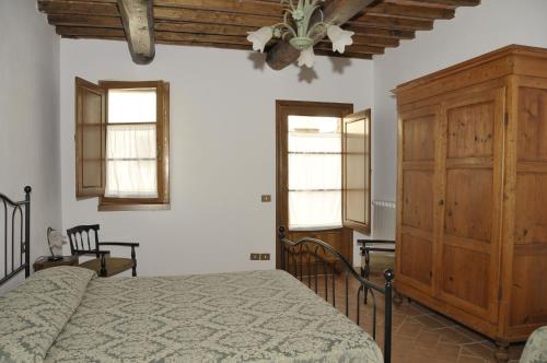 Postel nebo postele na pokoji v ubytování Agriturismo Renai e Monte II