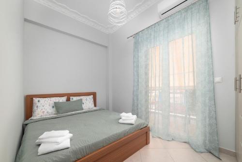 Postel nebo postele na pokoji v ubytování Cuka apartment 3BD nexto to metro and Piraeus Port