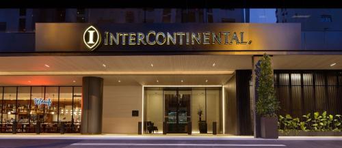 a building with a sign that reads international at InterContinental Singapore Robertson Quay by IHG in Singapore