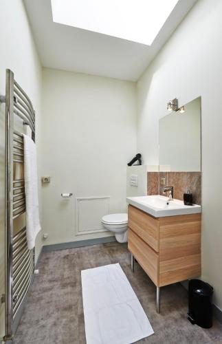 Koupelna v ubytování Appartements Rue Lemoine XXL
