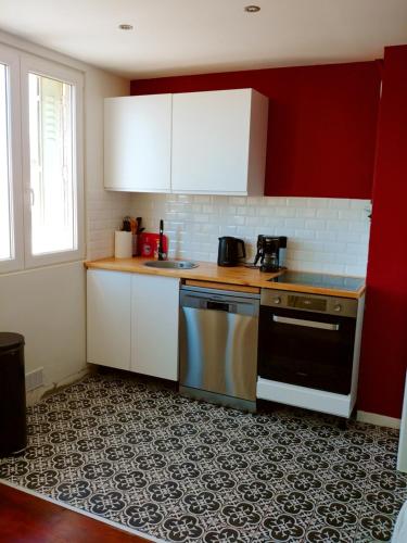 Η κουζίνα ή μικρή κουζίνα στο Cosy et lumineux 3 pièces 600m gare