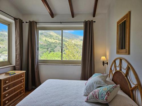 Postel nebo postele na pokoji v ubytování Villa Eolie