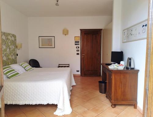 Postel nebo postele na pokoji v ubytování Arca Hotel