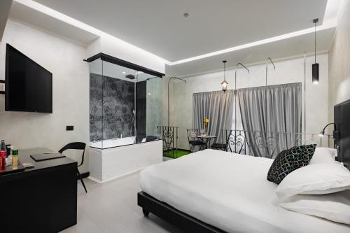 Postel nebo postele na pokoji v ubytování Dream Suite Trevi