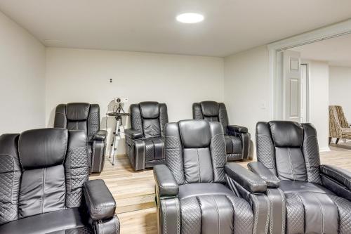 a waiting room with leather chairs and chairs at Movie Room and Home Gym Sinking Spring Home! in Sinking Spring